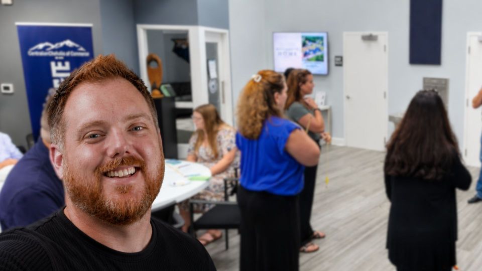 Andrew taking a picture at a PlayShop event