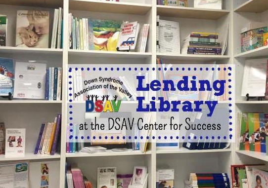 Bookshelves filled with educational materials at the DSAV Center for Success Lending Library.
