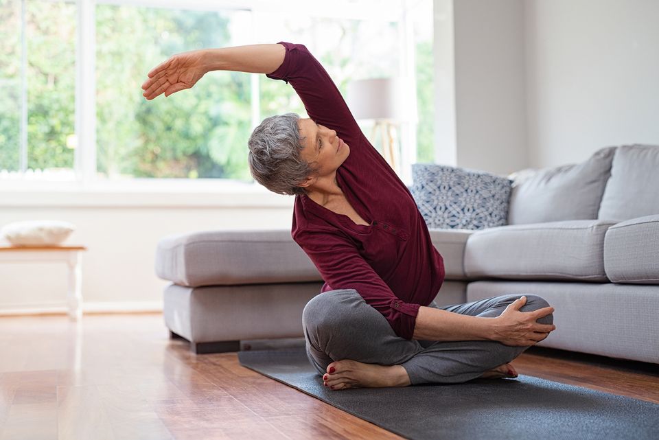 Bigstock senior woman exercising while  260538283