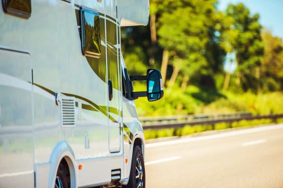 Camper van driving on open road during camper companion travel services on Long Island NY