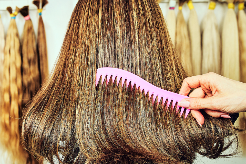 Combing and maintenance of a wig to preserve its style, condition, and natural appearance.