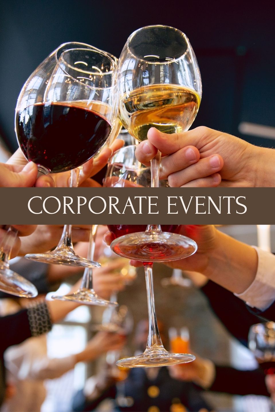 corporate event toast with wine glasses at elegant rustic venue setting