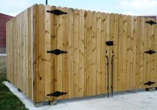 Weatherproofed stained privacy fence and gate