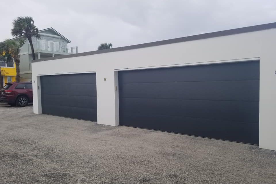 Tree of life2 retractable screen1garage doors