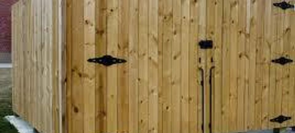 Weatherproofed stained privacy fence and gate