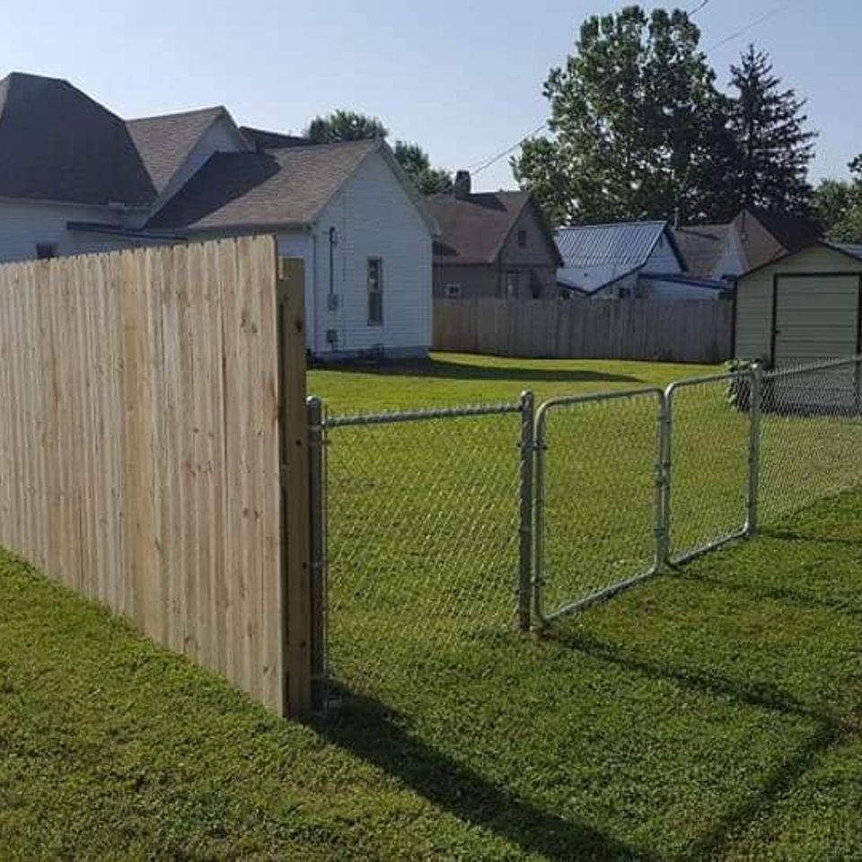 chain link and wooden privacy transition fence with double gate