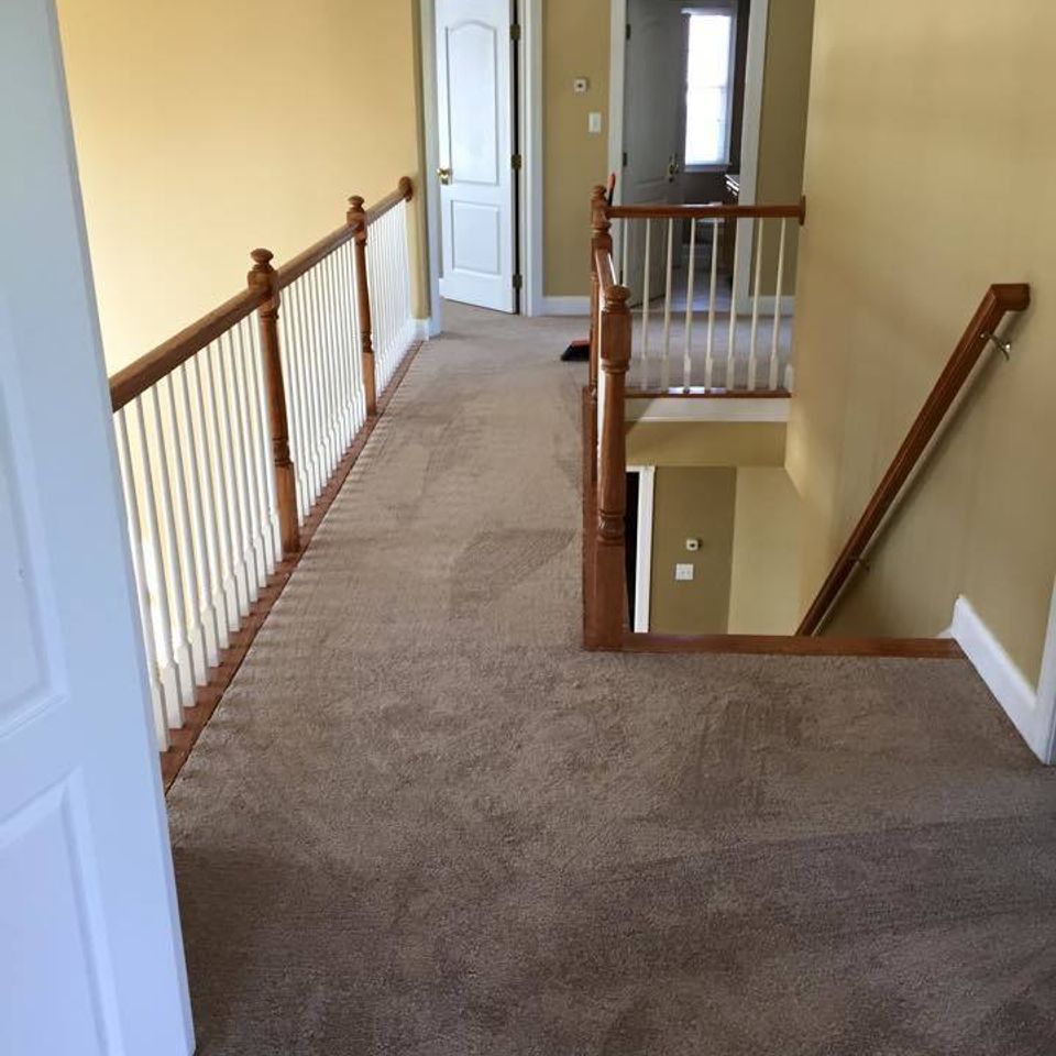 Residential wall to wall carpeting installed by Cover My Floors of Raleigh, NC.