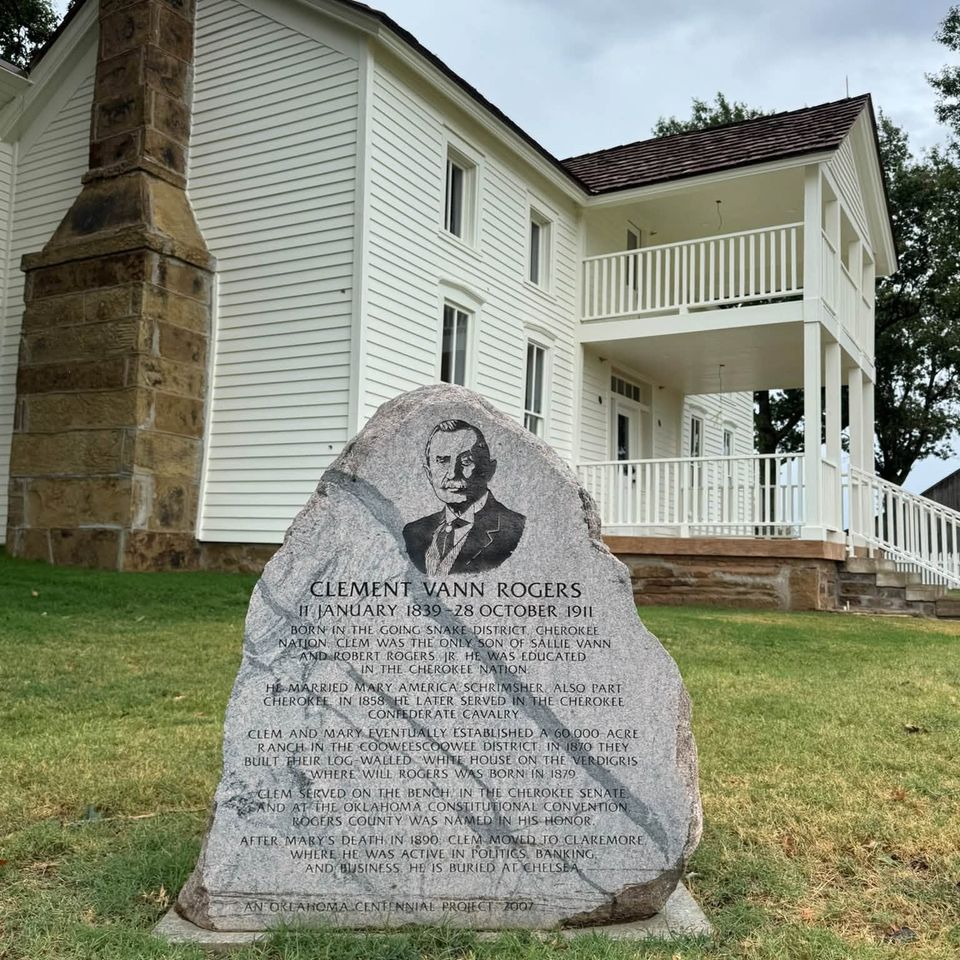 House with Stone placard