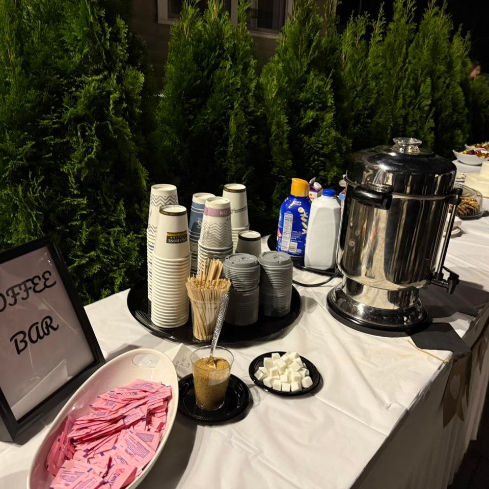 alt="The Party Savers staff bartending and waitressing at a Long Island Engagement Party"