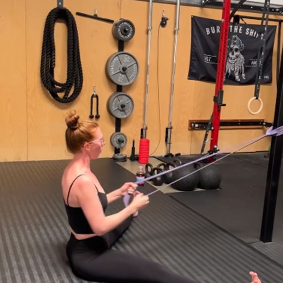 Bands and floor work by a Gym Truck Chico woman client at our new gym facility in Chico Ca 