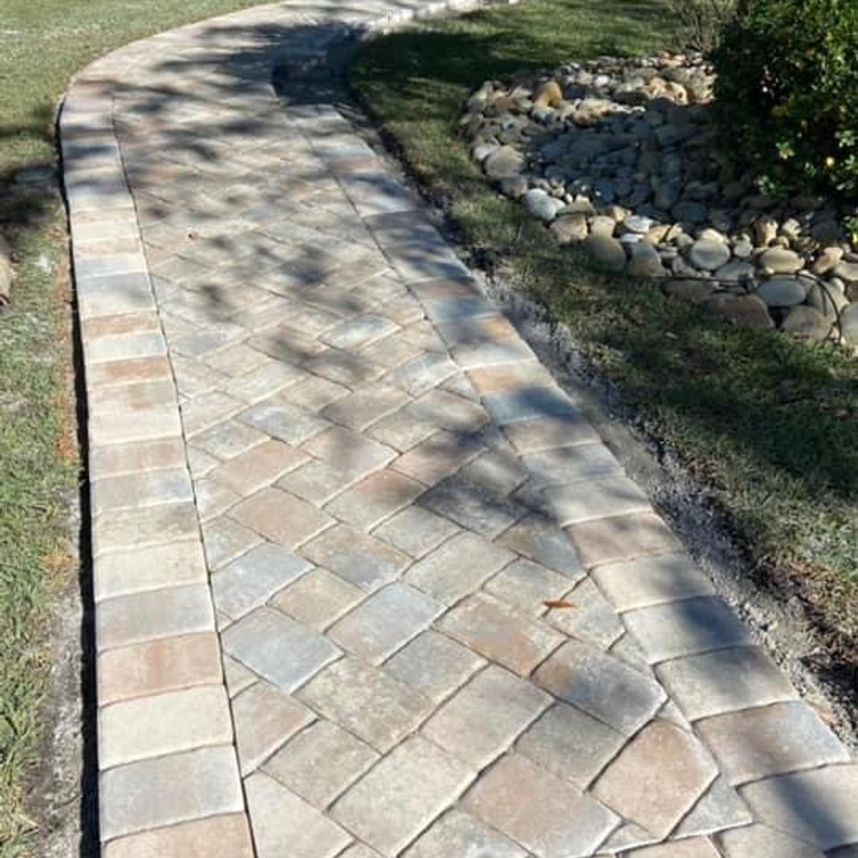 "Paver sidewalk constructed by Gabino Landscaping in Myrtle Beach, South Carolina."