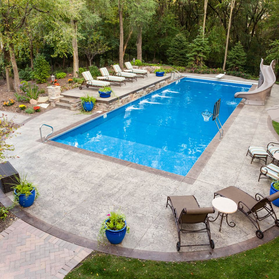 Stamperd concrete backyard swimming pool