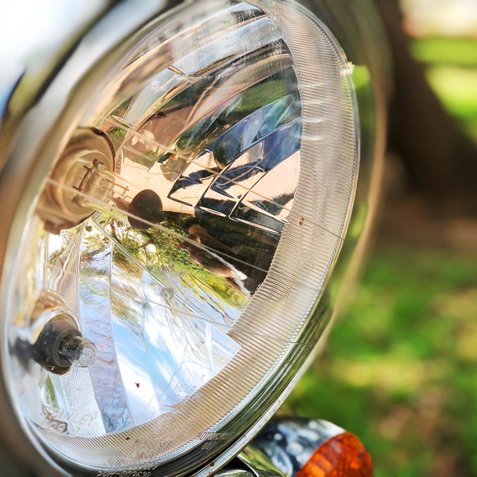 Bigstock chromed headlamp of a motorcyc 325083184
