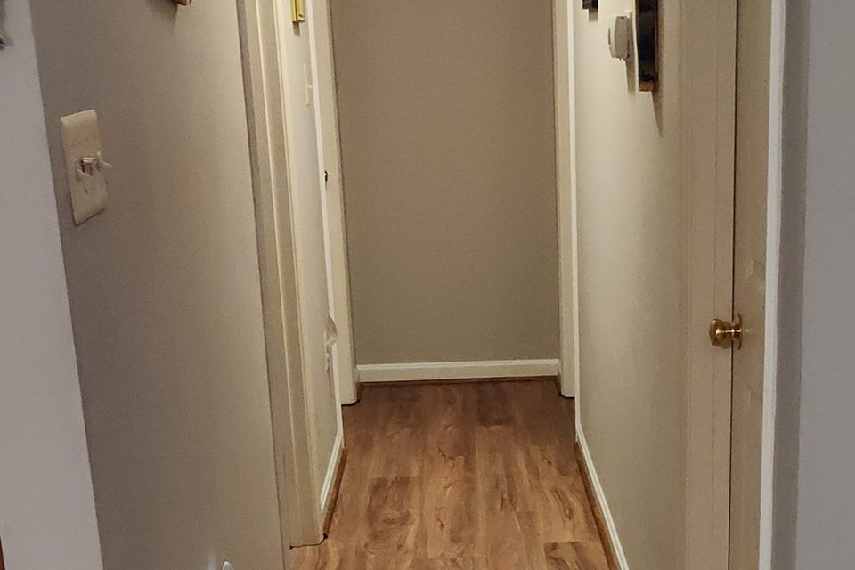 Installed a floating floor in hallway base shoe trimwork tj