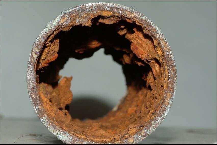 Cast iron sewer corrosion build up