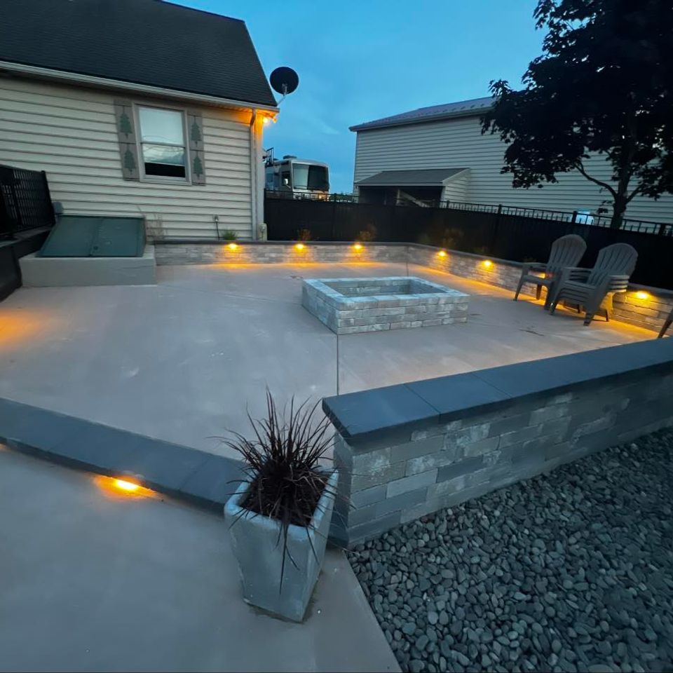 J's property maintenance lighted patio concrete