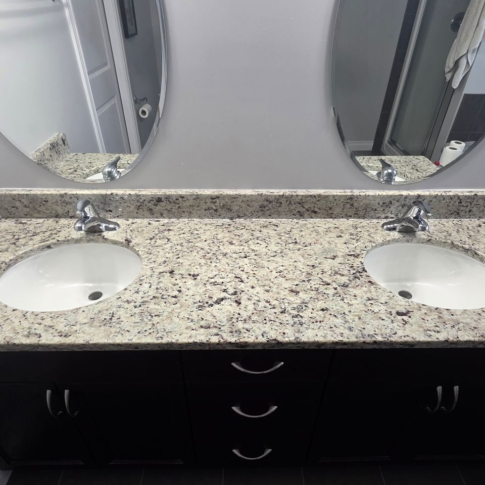 Double vanity bathroom countertop and two mirrors