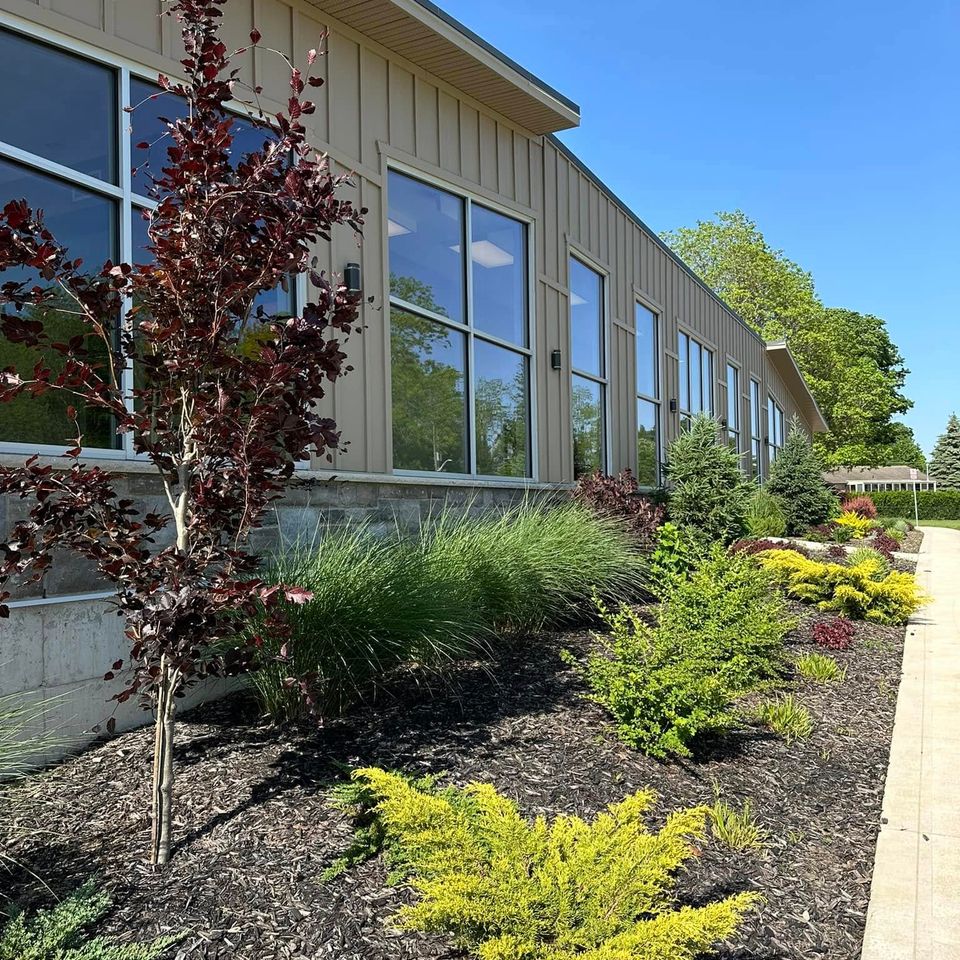 Clean windows and siding along a commercial building exterior in Tillsonburg Ontario