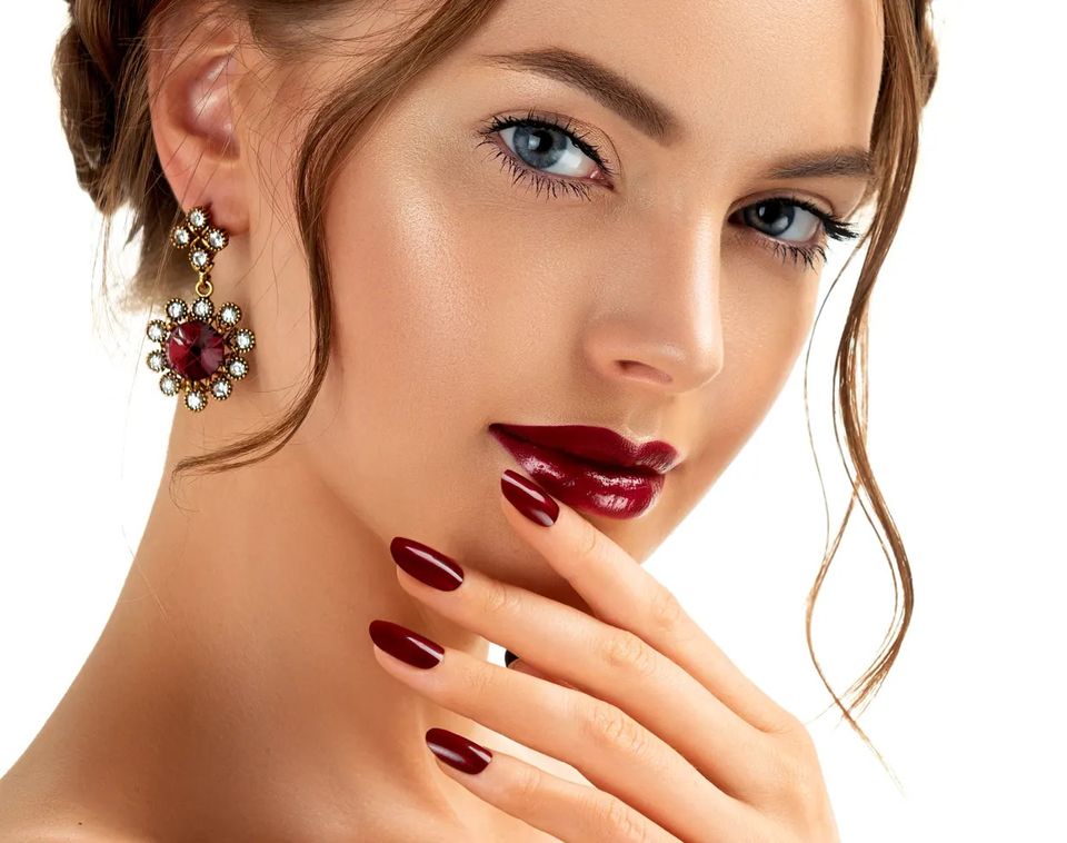Close-up of a woman with radiant, clear skin, representing the rejuvenating effects of the Inner Beauty IV formula