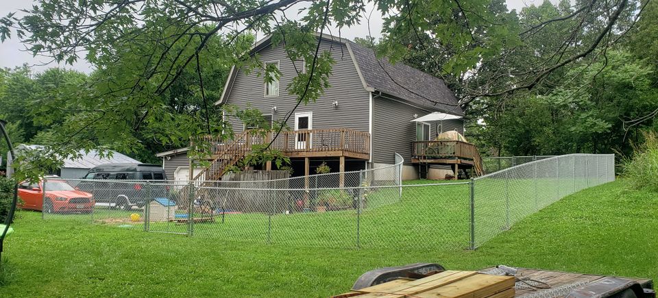 custom chain link fence sloped with rounded corners