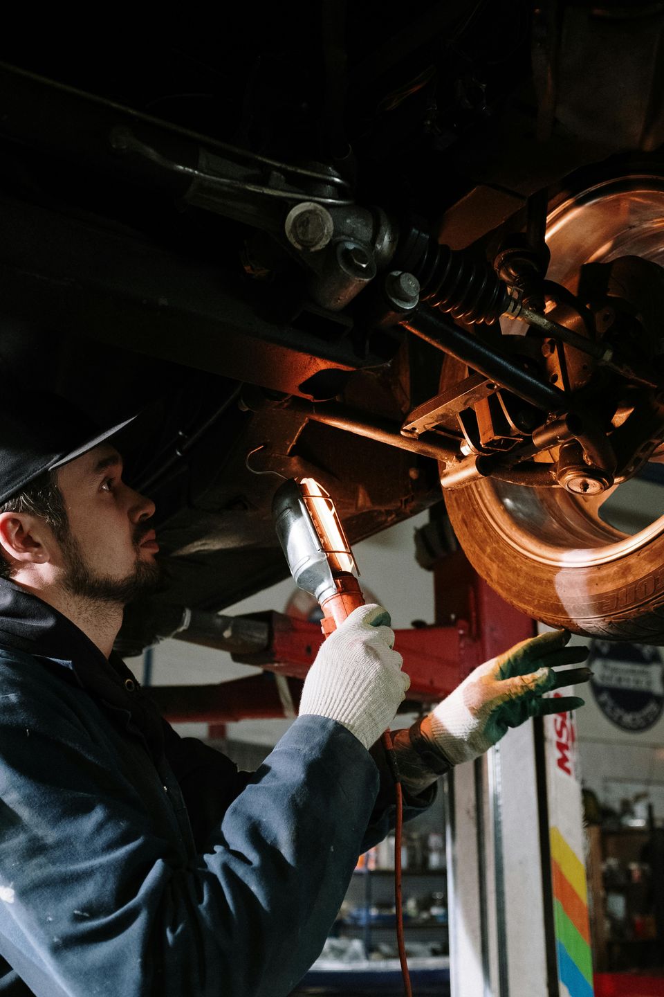 Image of a visual inspection of the undercarriage of a car