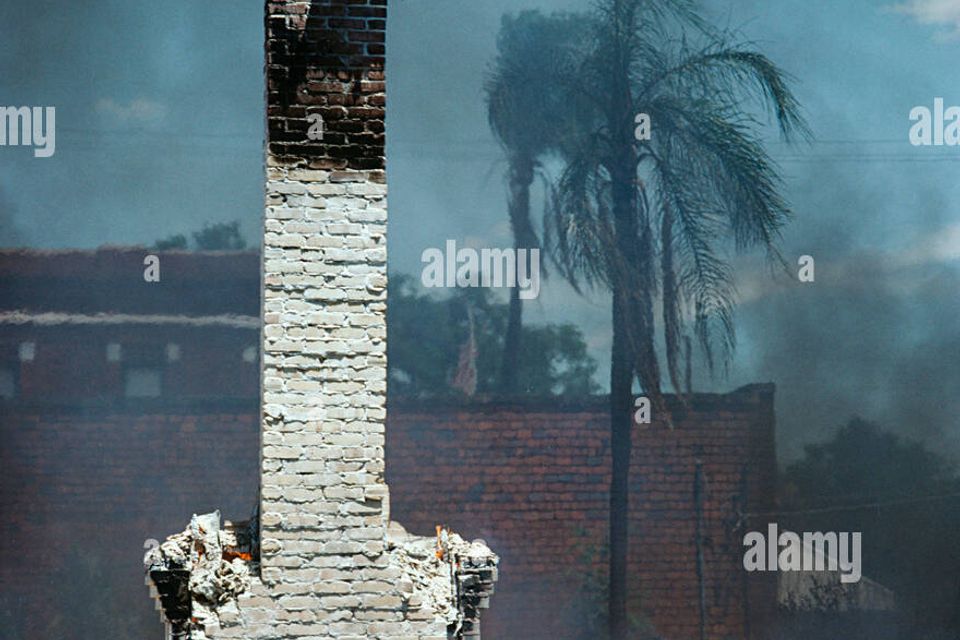 Fire damage destroyed house and standing chimney usa bkam47