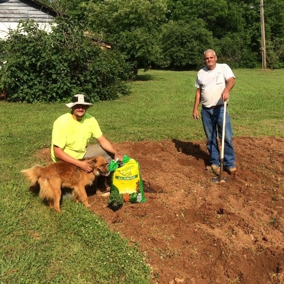 Michael sr and michael jr planting a garden (640x490)20180418 17059 18535dh