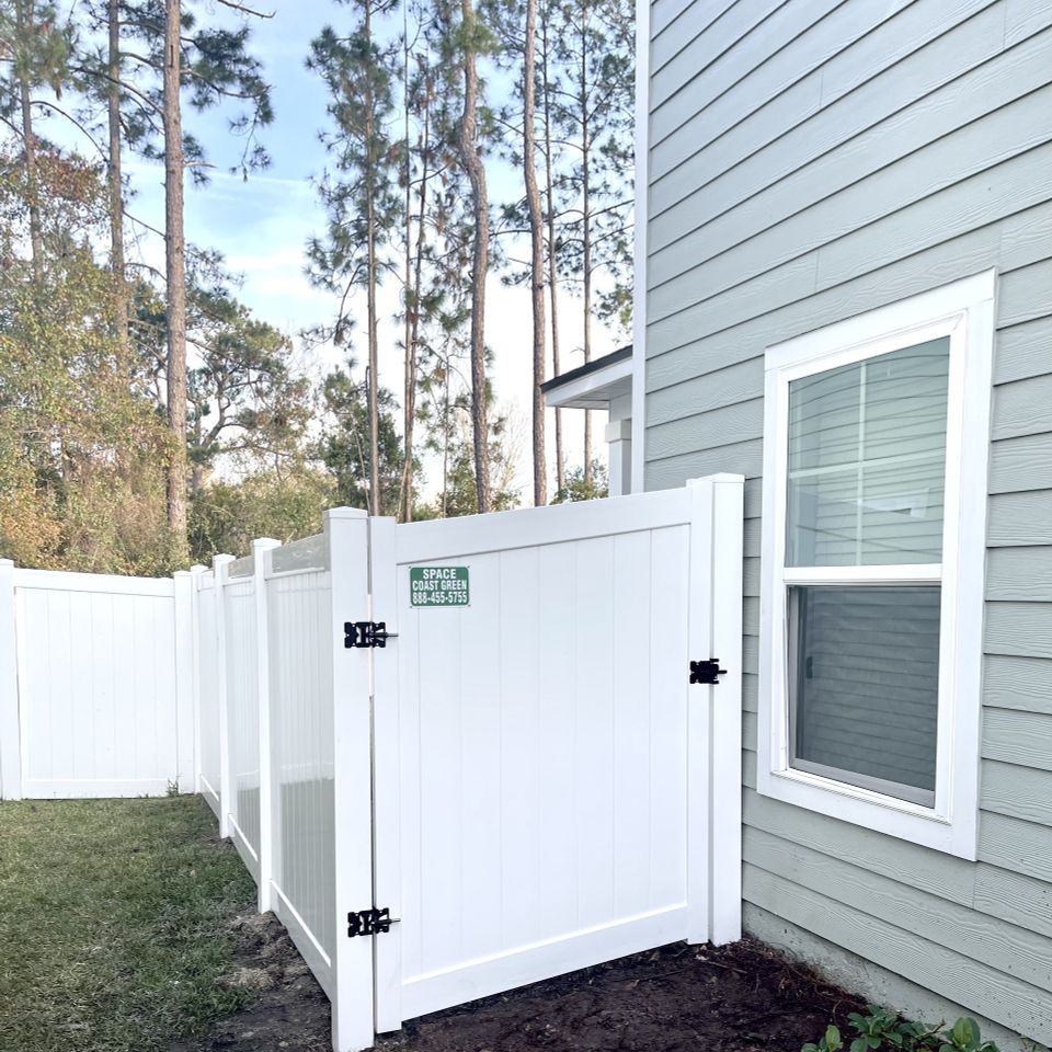 Space coast fence white gate