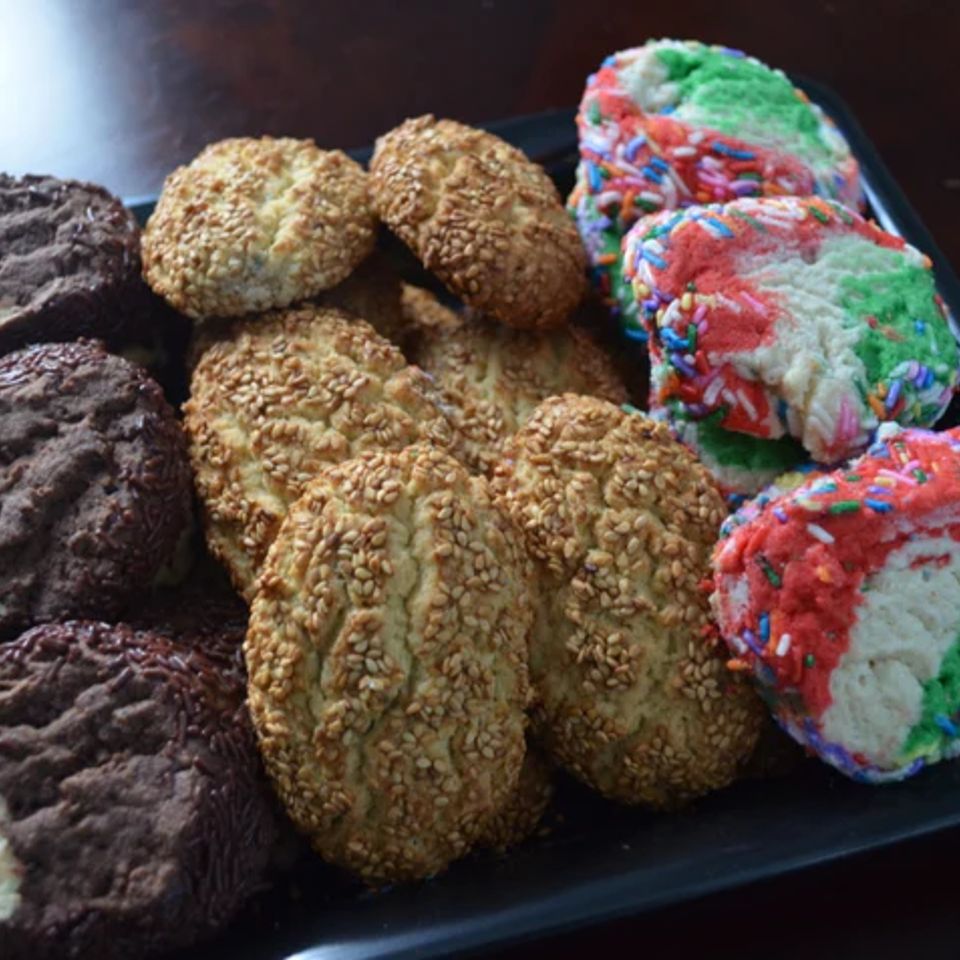 The Cocoa Bliss, Sesame and Champagne cookies lined up on a dish