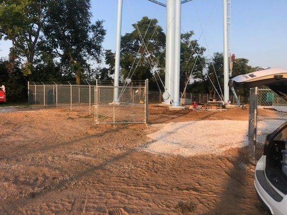 Security fence around water tower