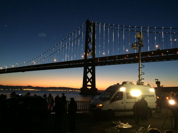 Bay lights with news truck