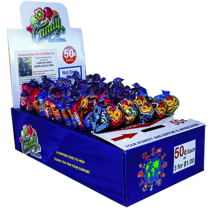 Honor boxes filled with lollipops on location. Lollipops displayed. Functional solution to vending a variety of candy.