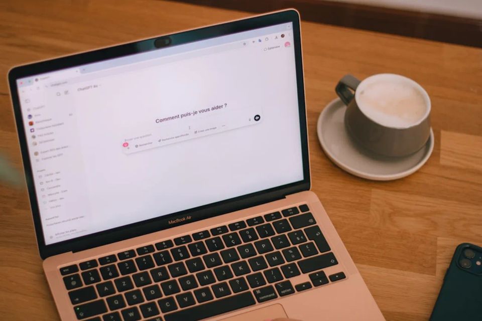 Website Launch Checklist PeachSites Image of MacBook Air with an esspresso