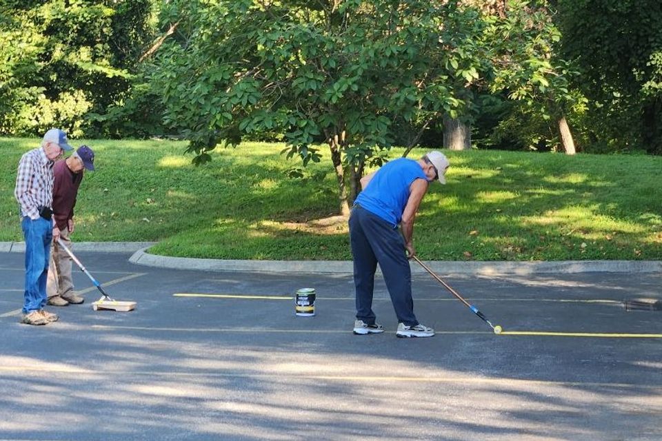 Painting stripes in parking lot 1