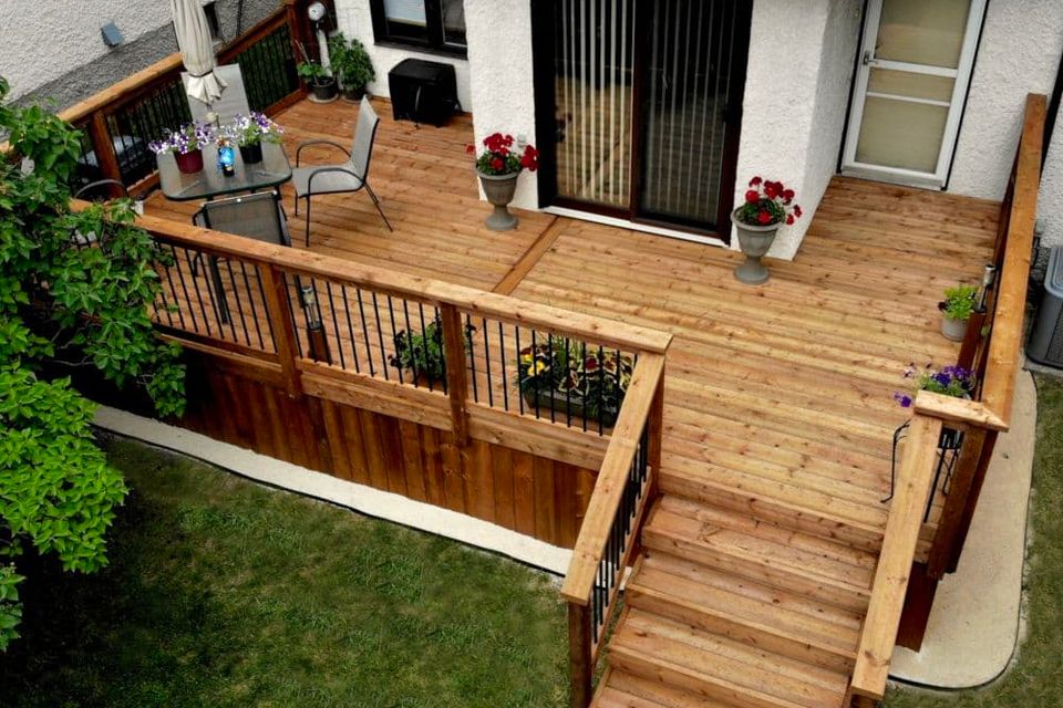 Single level brown treated wood deck