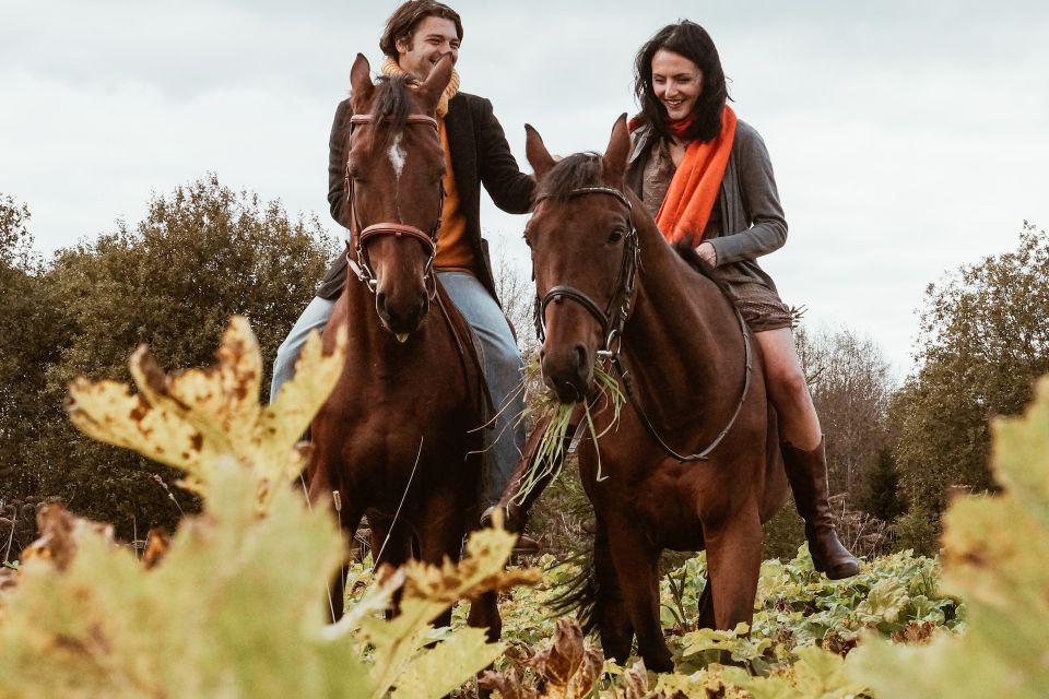 couples horse riding