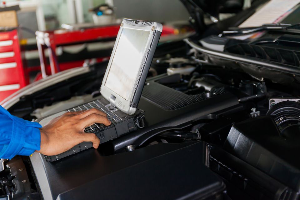 Bigstock mechanic using diagnostic mach 12620081320170903 29599 1khk63w
