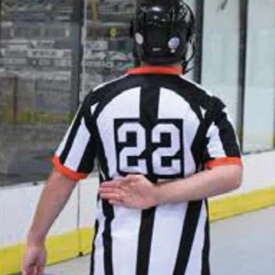 Referee checking from behind signal.jpg