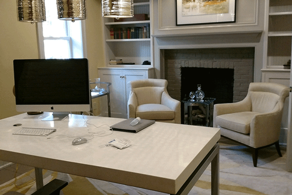 Updated fireplace with bookshelves after