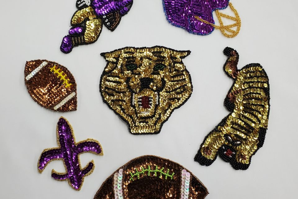Purple gold appliqués