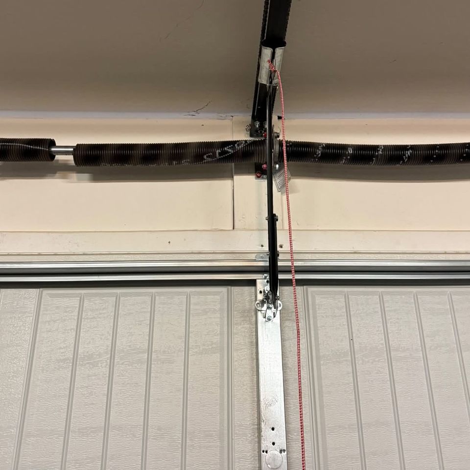 Broken garage door spring replacement