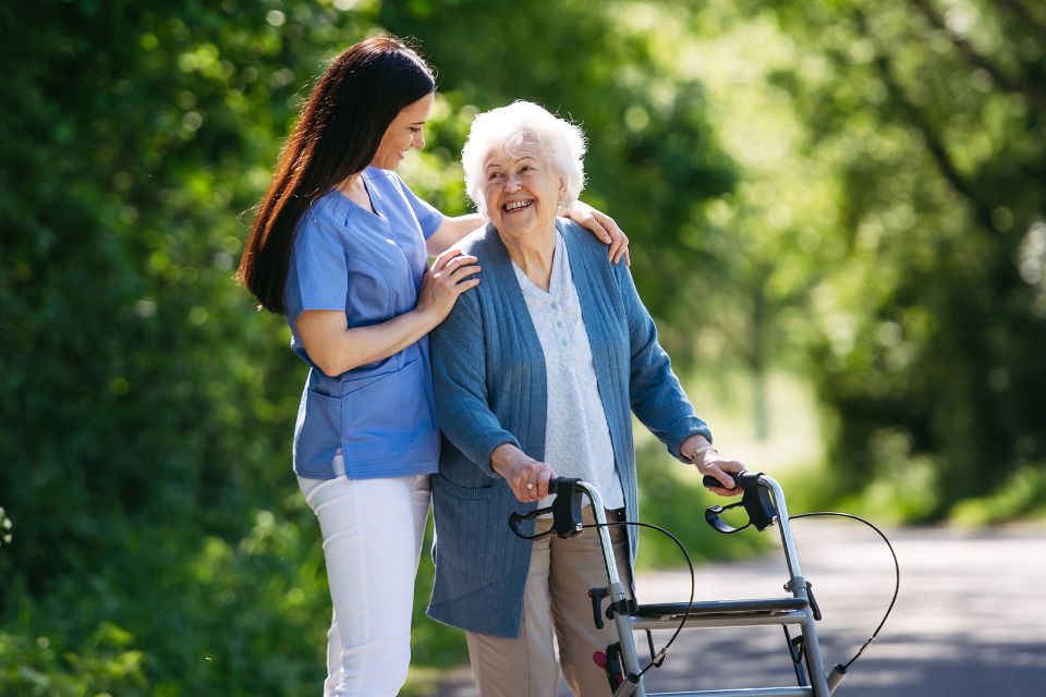 Caregiver walking with senior