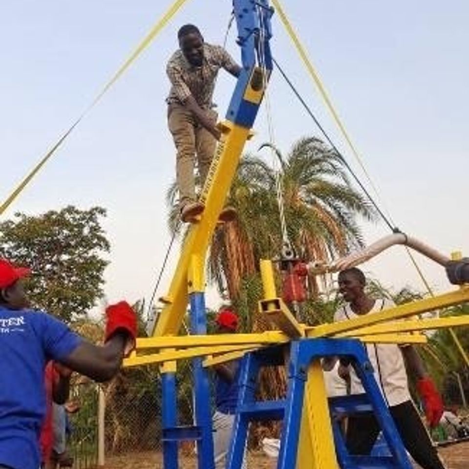 Drilling a borehole in gulu africa