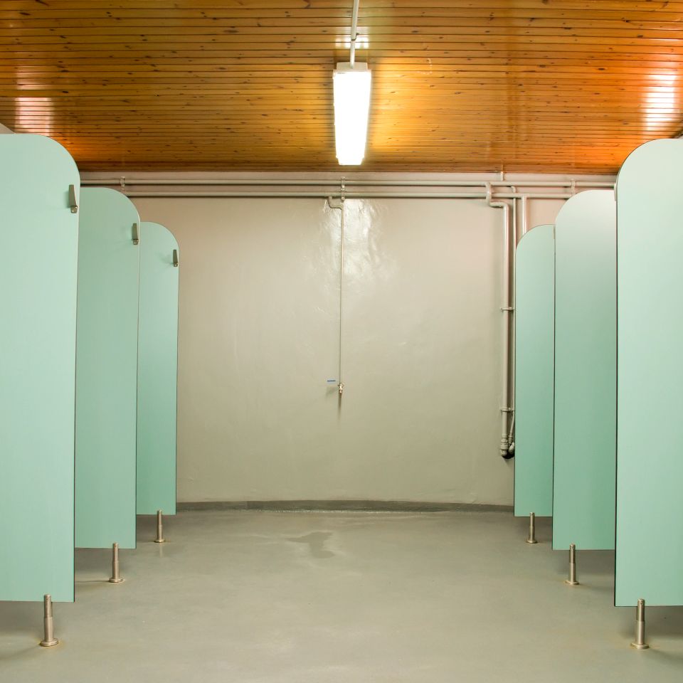 Sport club showers each with their own divider