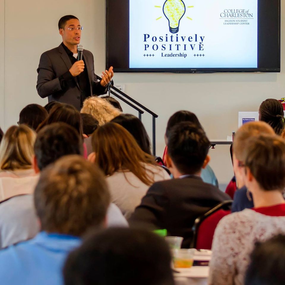 Action shot of lance speaking motivational speaking college student leadership conference