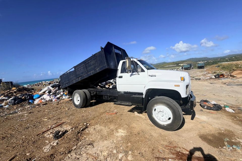   dump truck at landfill site