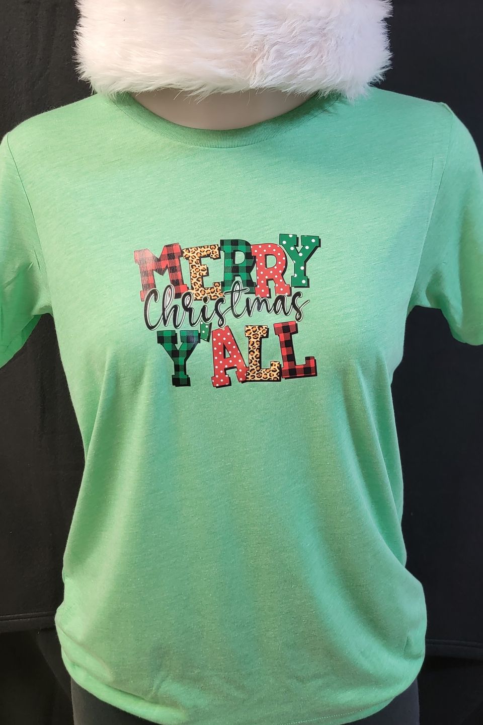 "DTF Direct-to-Film" example from SaRi's Creations - "Merry Christmas Y'all" on a green t-shirt