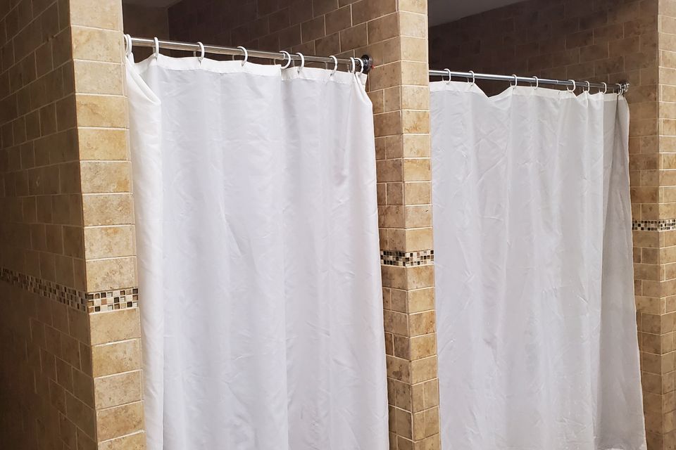 The showers in the locker room at Maximus Gym in Riverhead