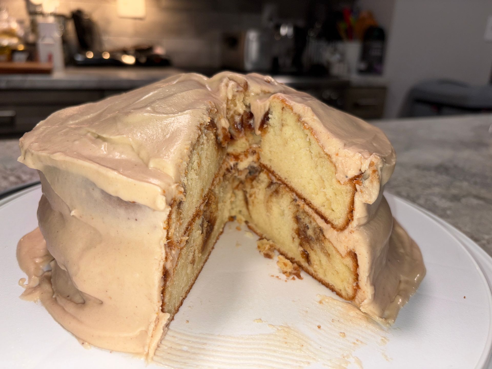 Whole Apple Butter Cake topped with creamy icing