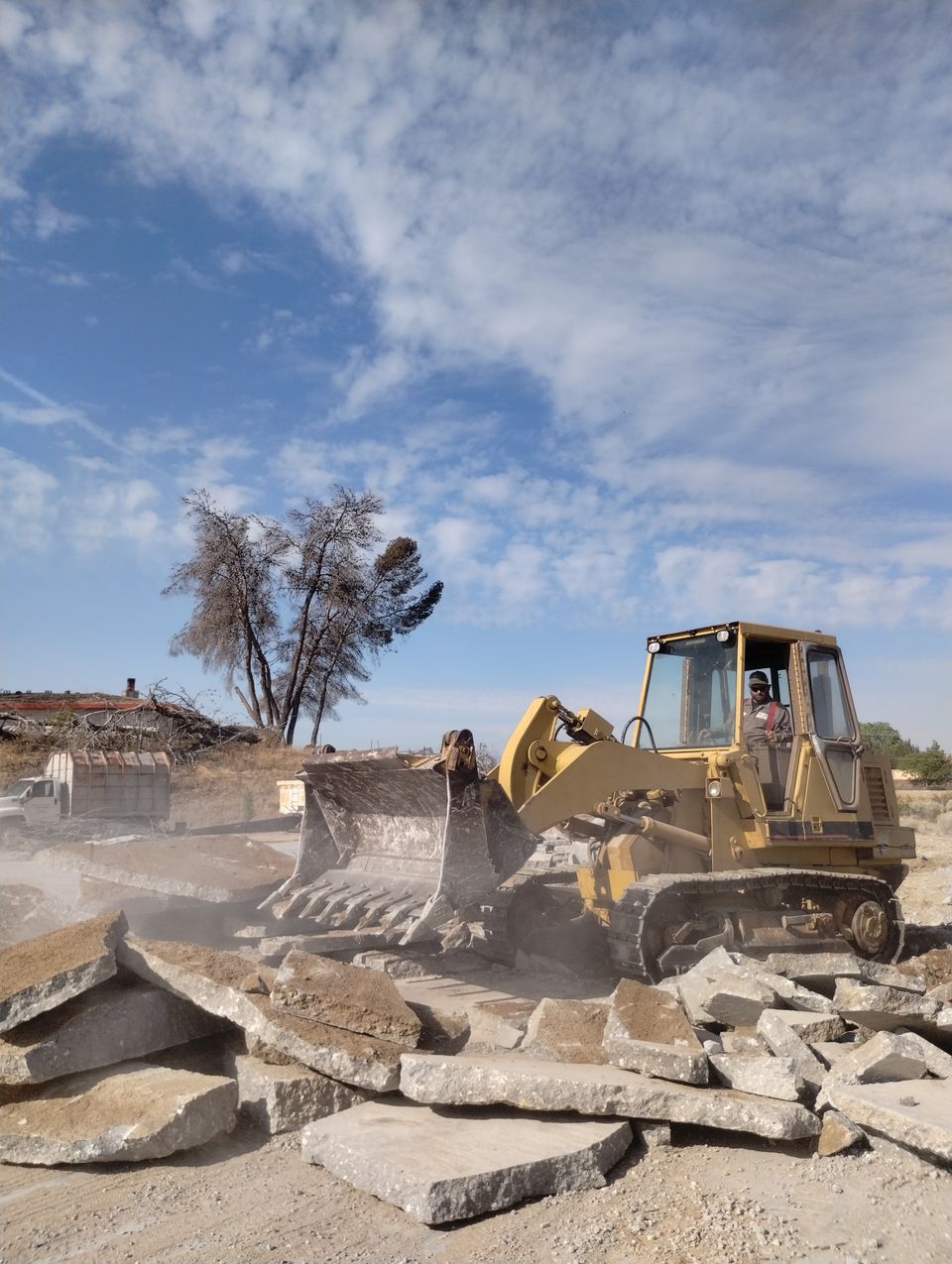 Image of a concrete slab being demolished